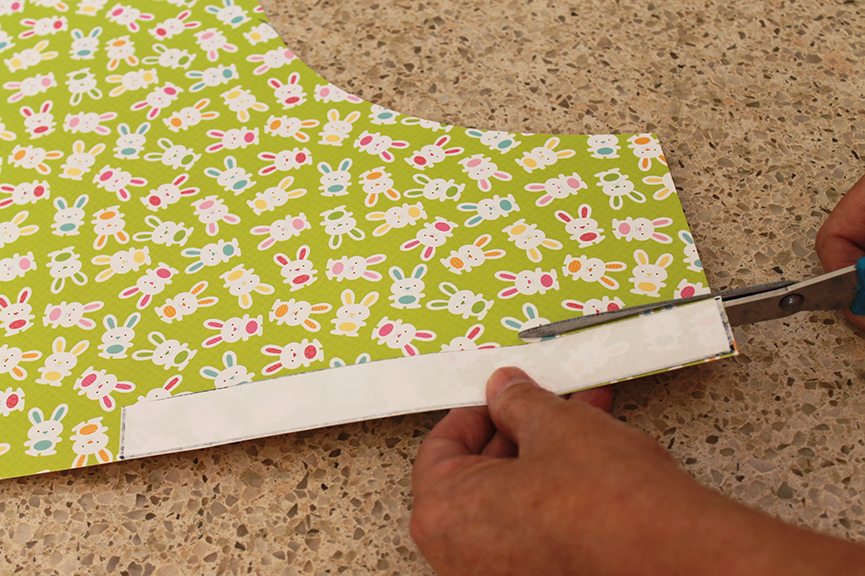 Cut the handle out of scrap book paper.