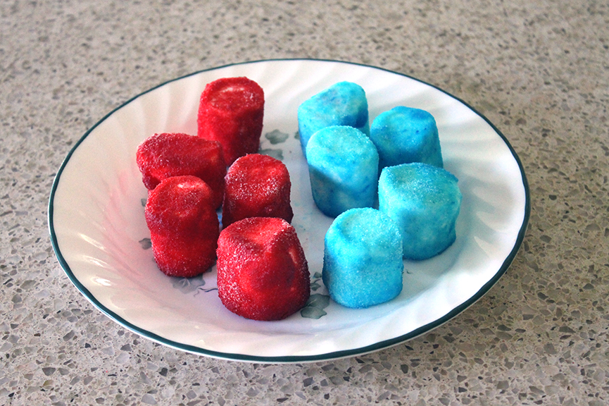 These Patriotic Pops are a super easy treat to make - wet marshmallows, roll in dry Jell-O, and put on a sucker stick!