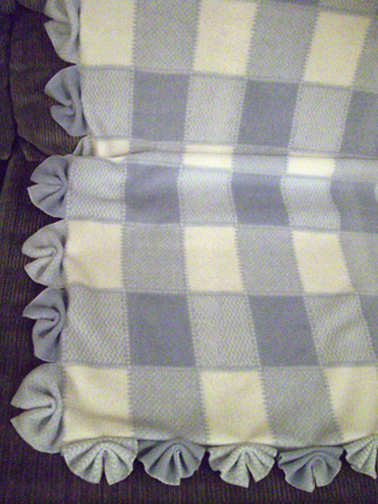 This fan-fold edging is an easy way to finish off a baby blanket.