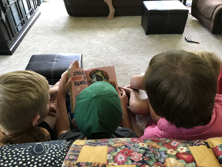 Reading with my grandkids.